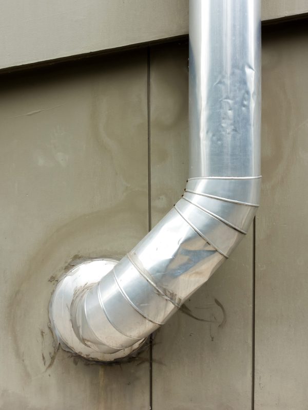 Shiny Air passage tube on building wall